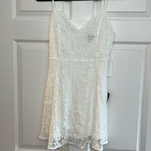 Lulu’s White Magnolia Blossom White Lace Skater
Dress